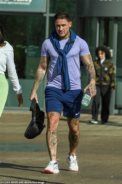 Sex Offender Stephen Bear Puts On Loved Up Display With His Brazilian Girlfriend As They Head To