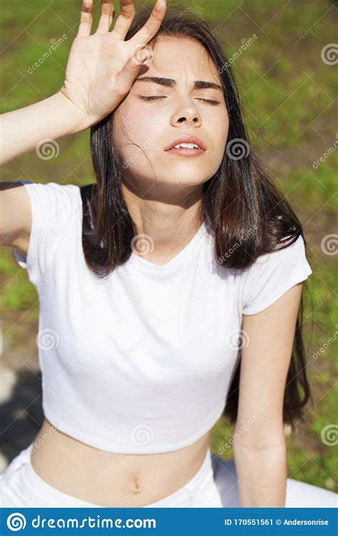 Beautiful Brunette Woman Posing Against Summer Park Bright Sunny