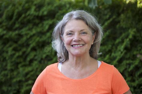 Outdoor Portrait Of Mature Cheerful Woman Stock Photo Image Of Adult Nature 322916150