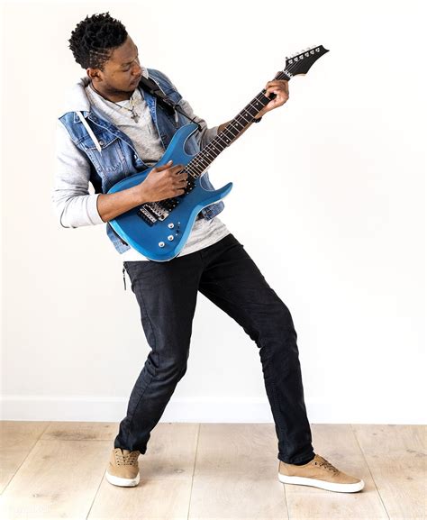 African Descent Man Playing Electric Guitar Premium Image By Rawpixel