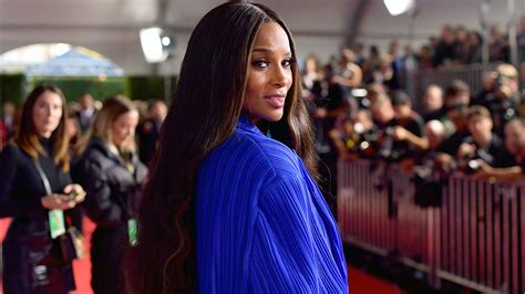 Ciara has fans convinced she's pregnant as she poses in form-flattering ...