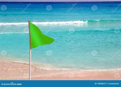 A Beach With Red Flag Royalty Free Stock Photo