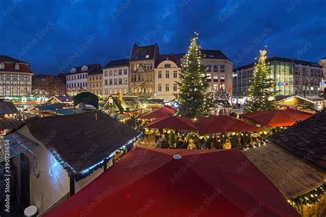 Gottingen, Germany. Christmas market at Market Square in dusk ... 