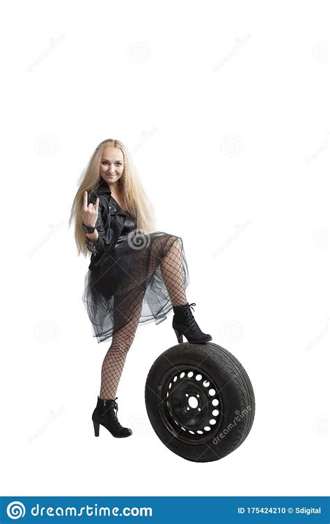 Blonde Posing On A Truck Wheel Stock Photo Image Of Rubber Dress 175424210