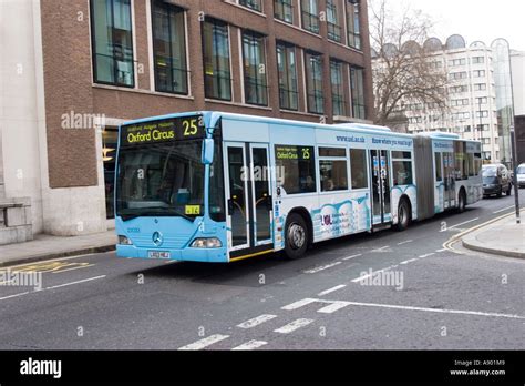 Blue london bendy bus in cheapside hi-res stock photography and images ...