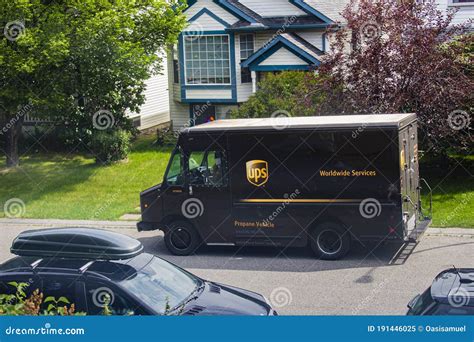 UPS Delivery Truck Parked by the Side of the Road in Front of ...