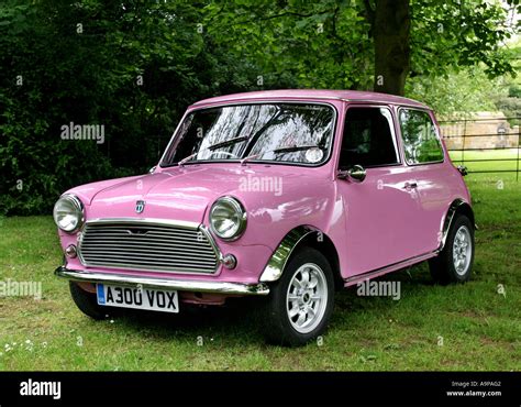 Pink Austin Mini Mayfair Car In The English Countryside Stock