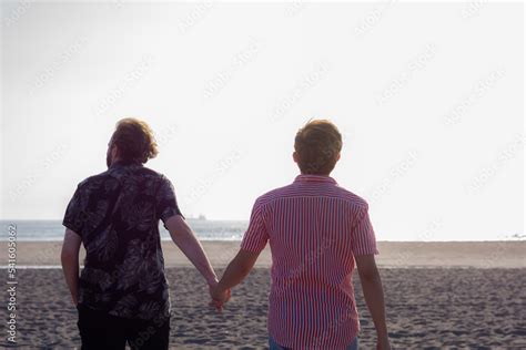 Boyfriends Holding Hands On The Beach Gay Couple Pride Month Stock Photo Adobe Stock