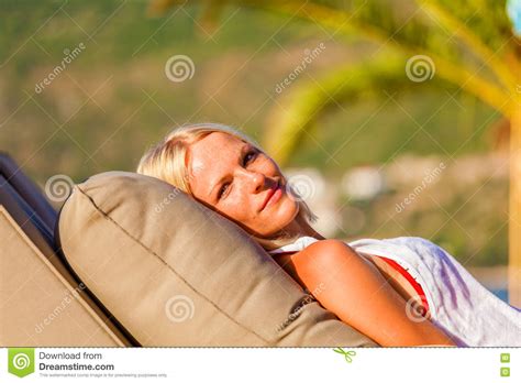 Blonde Woman Lying On Deckchair Enjoying Summer Holidays Stock Image Image Of Adult Chair