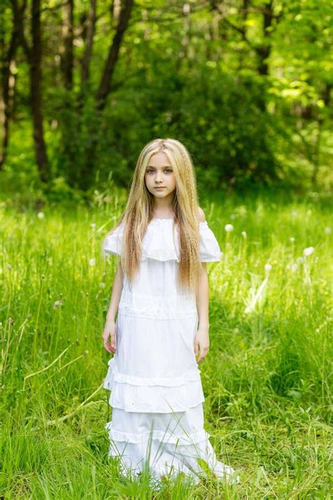Portrait Cute Blonde Girl Outdoors In Summer Stock Image Image Of Hair Dandelions