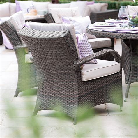 Nova Olivia 4 Seat Rattan Dining Set 1 05m Round Table Brown