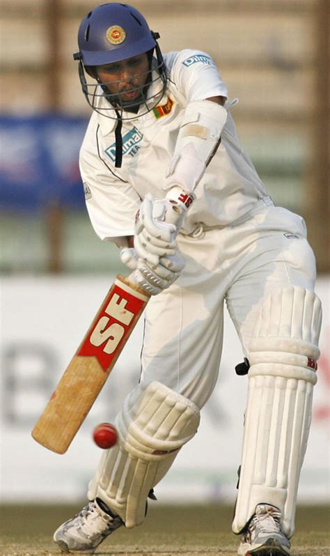 Tillakaratne Dilshan Raises His Bat After Reaching His Century