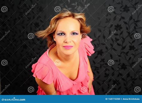 Blonde Girl In A Pink Dress In The Studio Stock Photo Image Of Glam Long 168773208