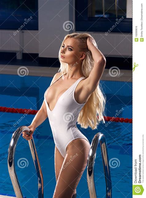 Blonde Woman In White Swimsuit Stock Photo Image Of Adult Figure
