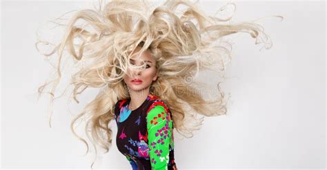 Beautiful Blonde Model With Amazing Eyes Wind Down Long Volume Hair With Highlights Stock Image