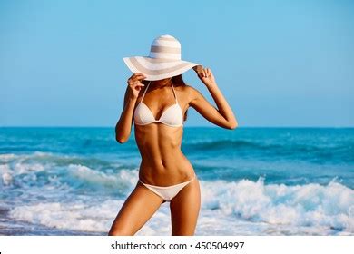 213 876 Woman In White Bikini On The Beach Images Stock Photos Vectors Shutterstock