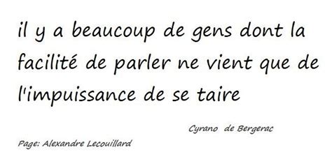 A Quote Written In French On White Paper