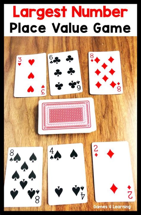 The Large Number Place Value Game Is Shown With Four Playing Cards In