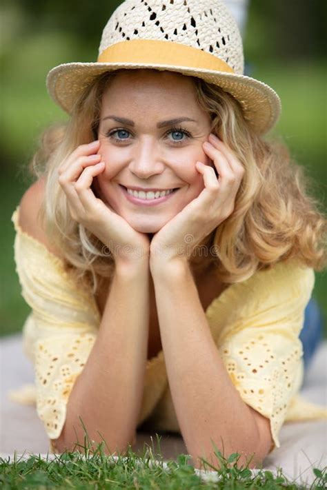 Blonde Pretty Girl Laying On Grass Stock Image Image Of Cheerful Hand 267512661