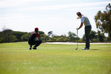 Thats Where You Have To Aim Your Next Shot. Rear View Shot of Two Men ...
