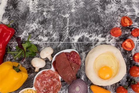 Ingredients For Cooking Pizza On Stone Table Top View Stock Photo
