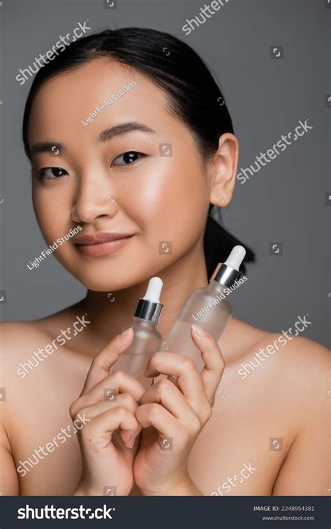Pleased Asian Woman Naked Shoulders Holding Stock Photo Shutterstock