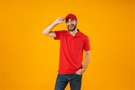 Premium Photo Portrait Of Happy Delivery Man In Red T Shirt And Cap