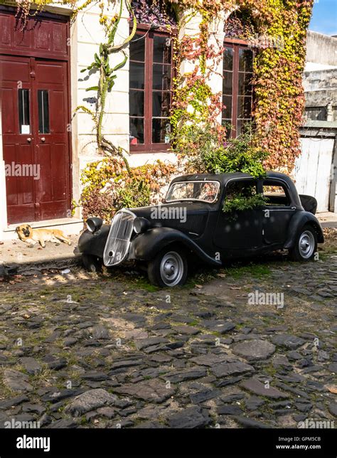 Old Car Parked In Front Of The Old House Stock Photo Alamy