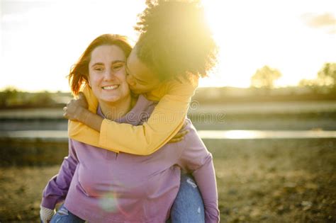 Happy Lesbian Couple Hugging In Park Stock Image Image Of Delight Cheerful