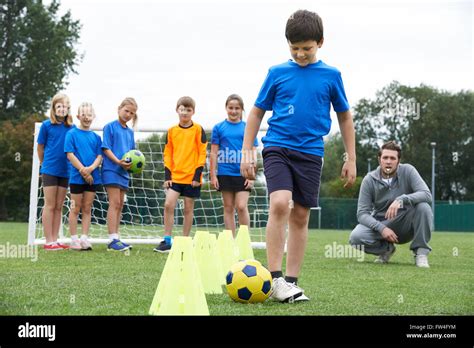 Coach Leading Outdoor Soccer Training Session Stock Photo Alamy