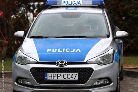 Radiowóz polskiej policji w czasie patrolu miejskim Stock Photo Adobe