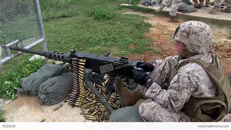 Browning M2 50 Caliber Machine Gun And M240G Medium Machine Guns Stock