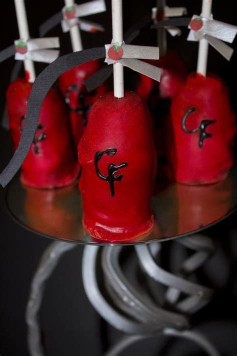 Red Velvet Cake Pops That Resemble Fire Extinguishers With CF For