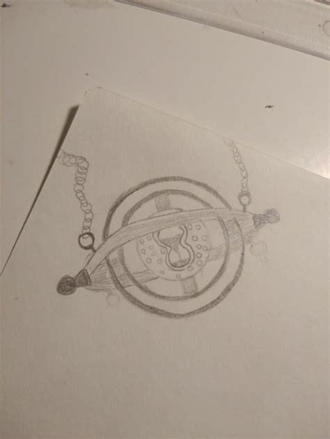 A Drawing Of A Clock On Paper With Chains Hanging From It S Sides And