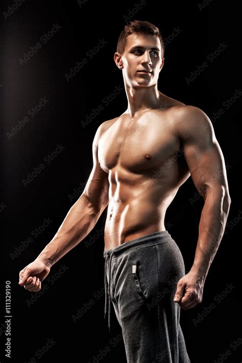 Image Of Very Muscular Man Posing With Naked Torso Stock Photo Adobe Stock