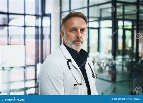 Im Tired But Determined To Keep Healing Cropped Portrait Of A Handsome Mature Doctor Standing
