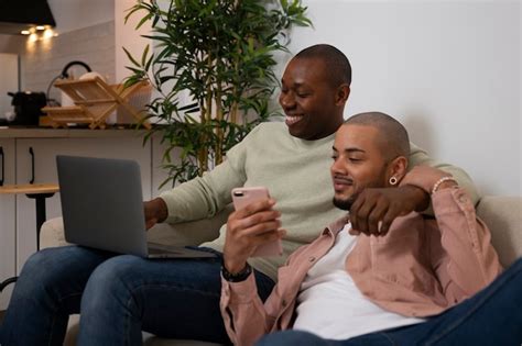 Free Photo Side View Gay Couple Spending Time Indoors