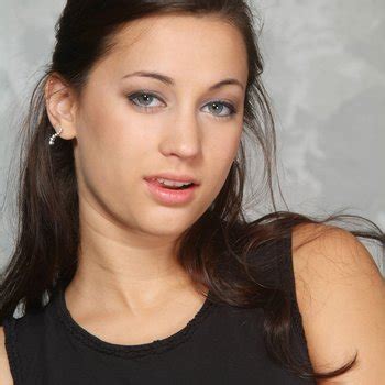 Georgia Jones Slowly Takes Off Her Stockings And Teases With Pussy Photos