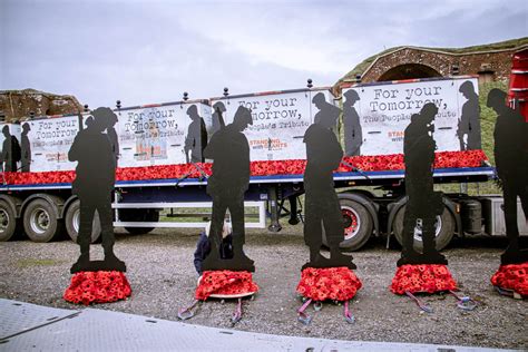 Biker convoy carrying giant silhouettes of fallen soldiers stops in Portsmouth en-route to France