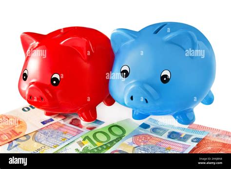 Finances And Banking With 2 Red And Blue Piggy Banks And Euro Banknotes