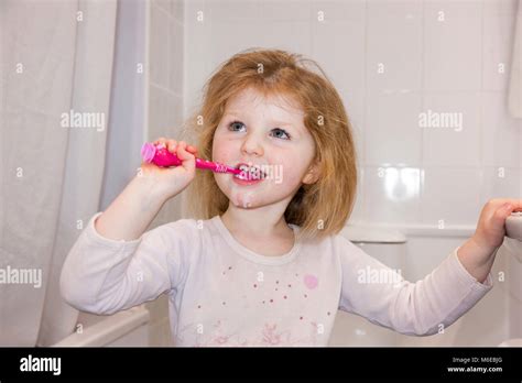 Three Year Old Child Kid Aged 3 Years Brushing Her Own Milk Teeth