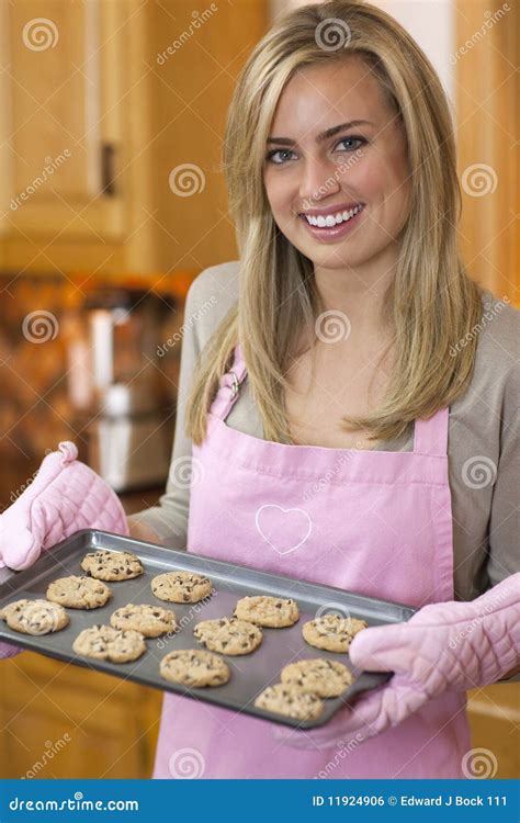 Young Woman Baking Chocolate Chip Cookies Royalty Free Stock Image