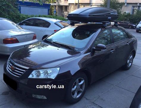 Багажник Thule-754 Aero Black и бокс Terra Drive-480 (черный) на Geely ...