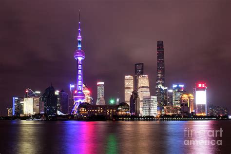 Stunning Shanghai Skyline Illuminated By City Lights At Night