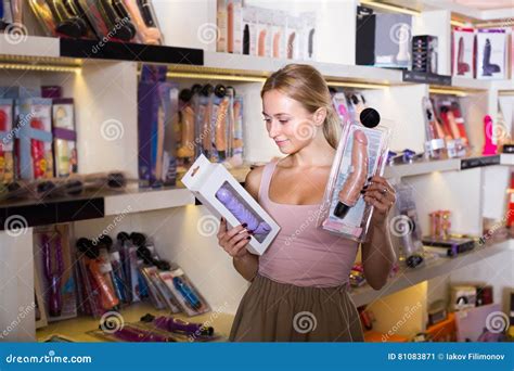 Adult Girl Choosing Toys In Sex Shop Stock Image Image Of Lifestyle Customer