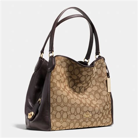 Coach Edie Shoulder Bag 31 In Signature Jacquard In Light Gold Light Khaki Chalk Metallic Lyst