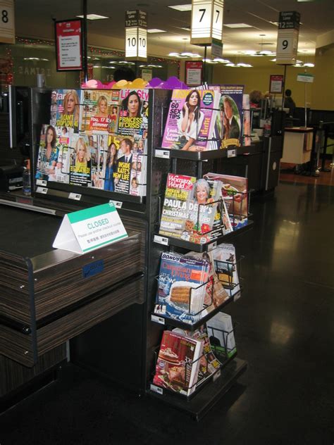 Check Out Magazine Rack Apple Display Products Ltd