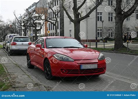 Old South Korean Sports Coupe Car Hyundai Tiburon Parked Editorial