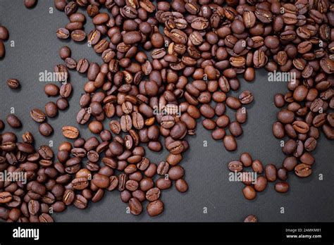 coffee beans on dark background Stock Photo - Alamy