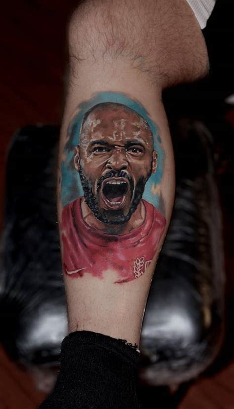Realistic Thierry Henry Portrait Tattoo On The Lower
